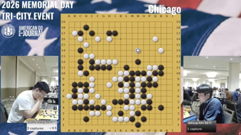 Puzhu Wang 5D (left) plays White against Dohyup Kim 8D in Round 4 of the 2026 Chicago Open on Board 1 on May 23, 2026. The position shown is move 120. Board 1 was livestreamed by the Official AGA YouTube Channel.