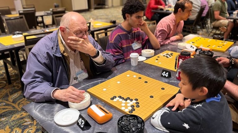 Isaac Huang 16k (right) plays against Robert Pociask 14k in Round 1 of the 2026 Chicago Go Open on May 23, 2026. Photo by Mark Rubenstein.