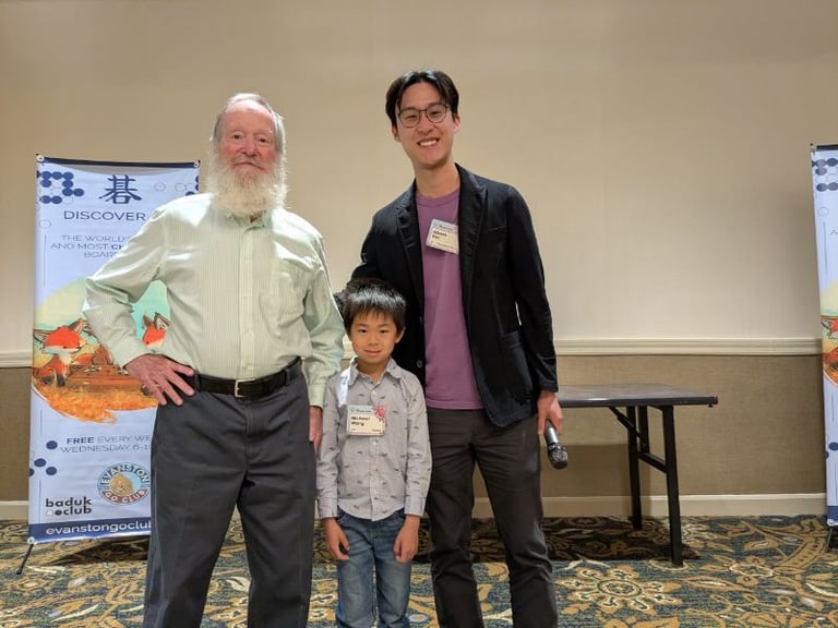 Bob Barber, Michael Wang, and Albert Yen (left to right) pose for the honorable mention award at the awards ceremony. Photo by Xinming “Simon” Guo.
