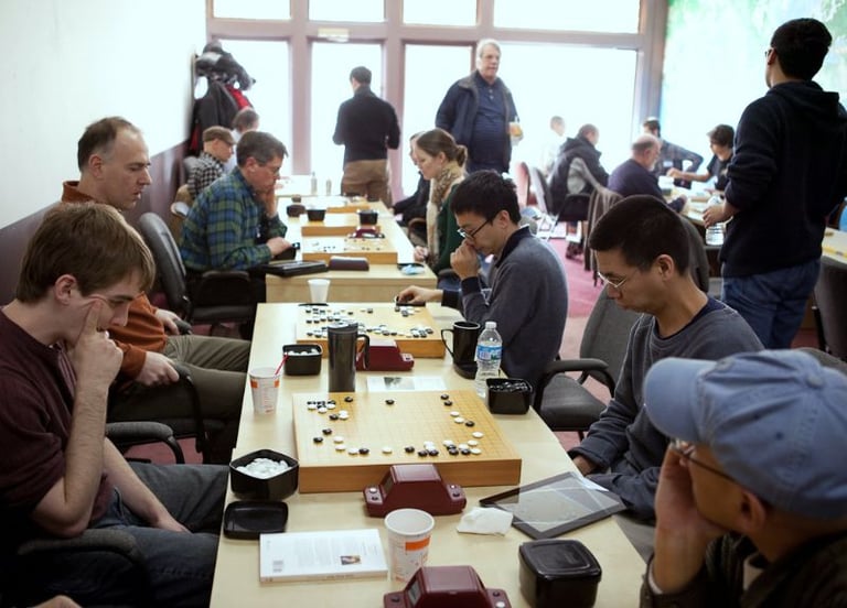 Players compete at Barber’s “I Sing the Body Electric” tournament on Feb. 11, 2012, at the Go Center in Arlington Heights, Ill. The 42-player field set a record for the venue. Photo by Daniel Smith. Source: https://aga-news-archive-viewer.azurewebsites.net/api/news-archive/article/6612.